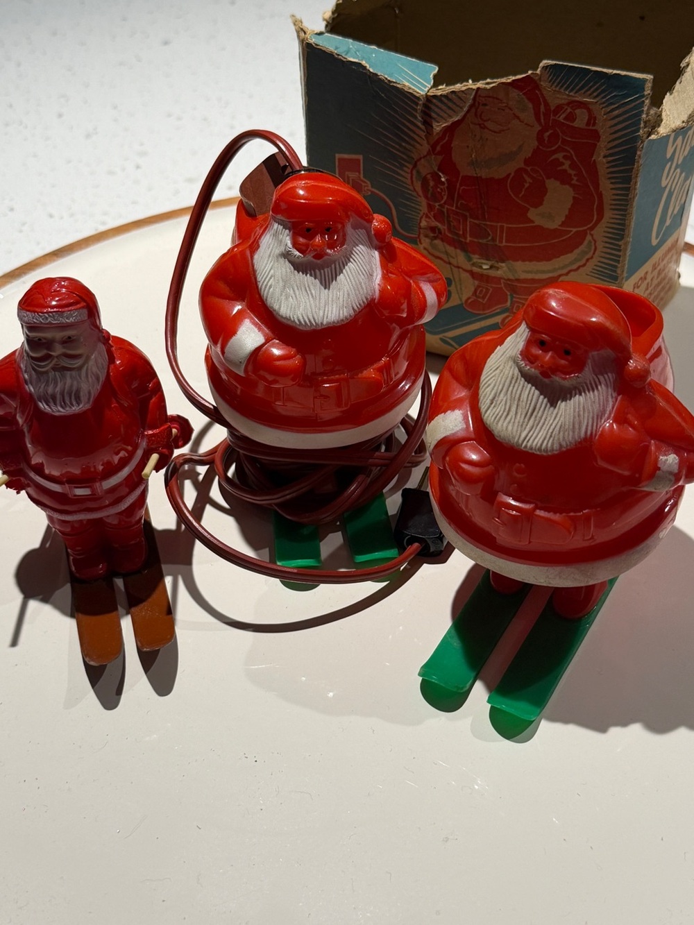Vintage Red Plastic Skiing Santa Christmas Figures (lot of 3)